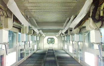 Track type spray booth