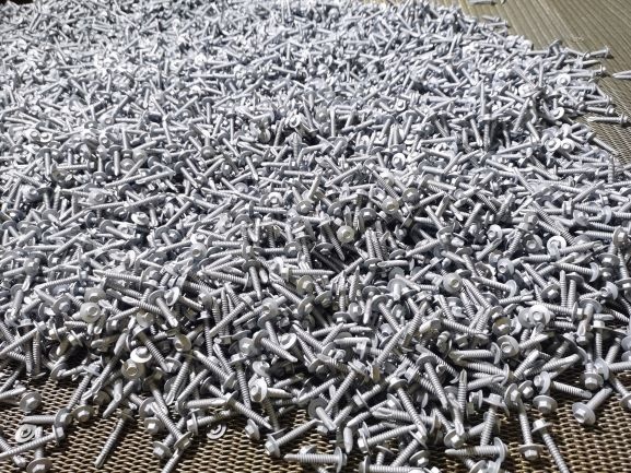 Coated dried and cooled molded parts