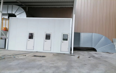 Dry spray paint room exhaust system